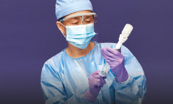 pharmacist with cstd syringe unit